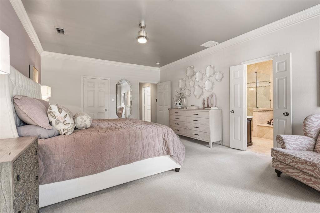 Two walk-in closets in primary bedroom