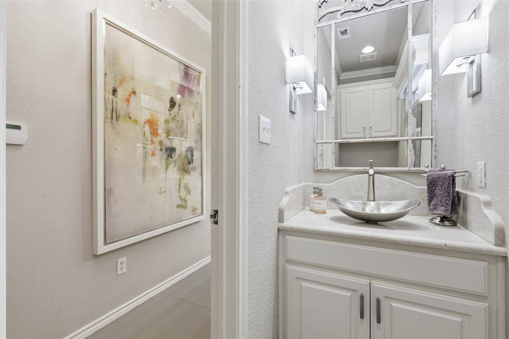 Powder bath near kitchen and laundry room