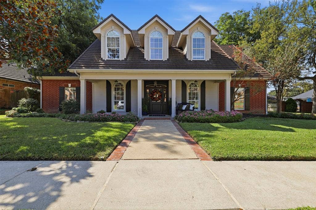 Southern Living style home with gorgeous yard