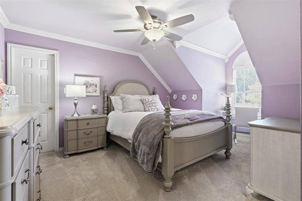 Another upstairs guest bedroom with walk-in closet and dormer