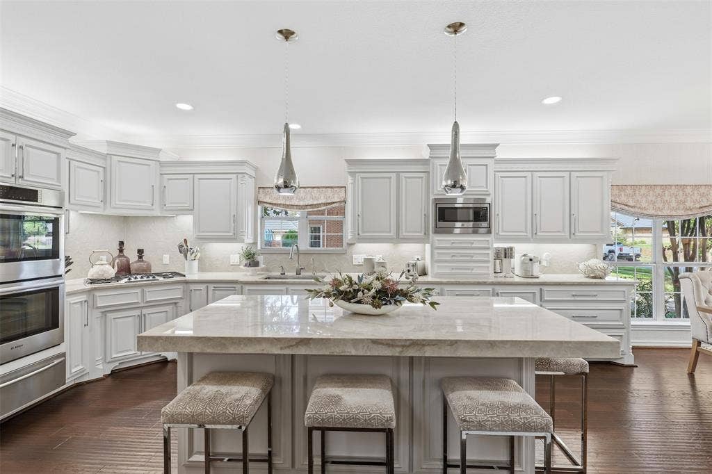 Massive island with Taj Mahal quartzite coutertops