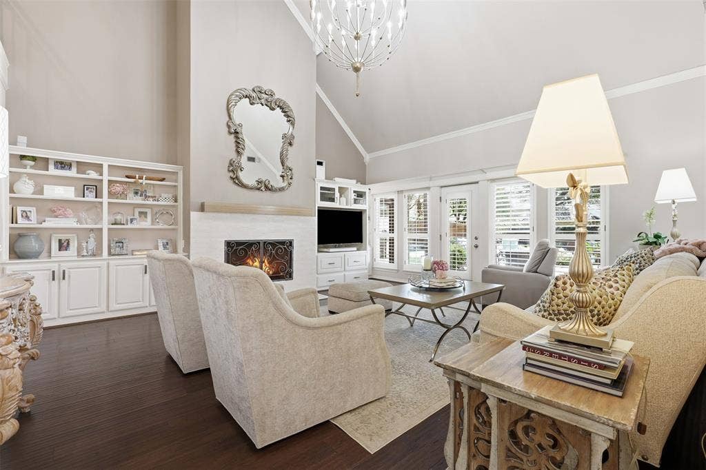Beautiful gas log fireplace, vaulted ceiling and wood floors