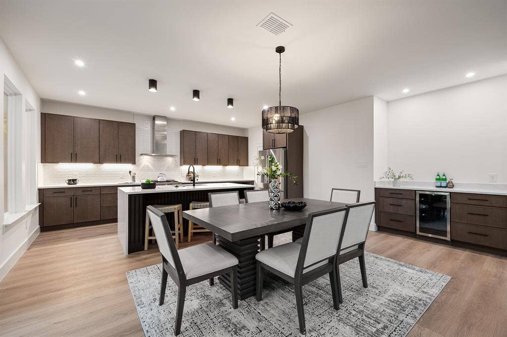 2719 Andrea Lane, Dallas, TX 75228 Dining area with a dry bar fit with a mini fridge.