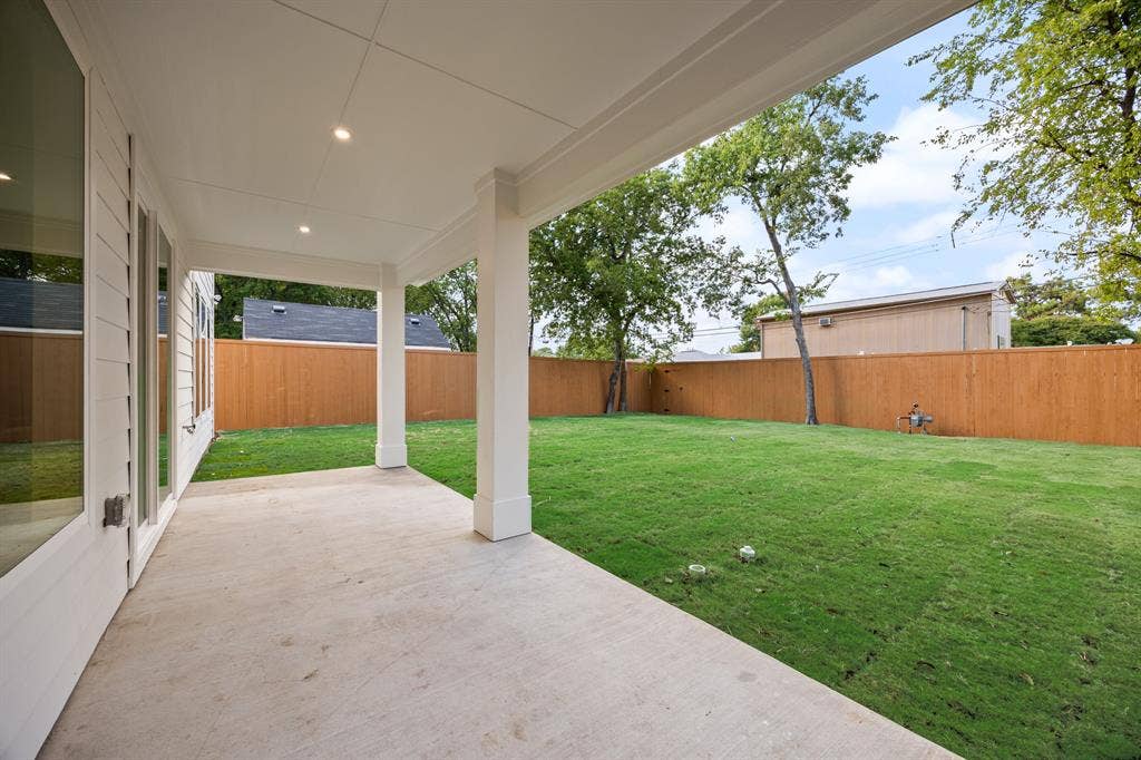 2719 Andrea Lane, Dallas, TX 75228 8-foot privacy fence around the yard.