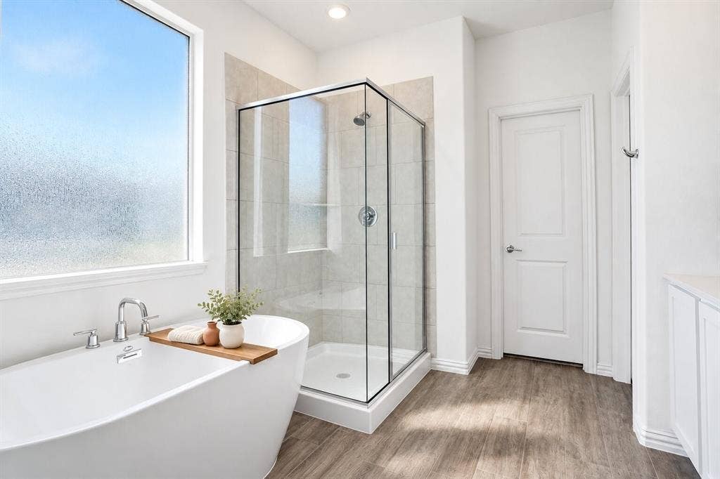 317 Red Cedar Drive, Princeton, TX 75407 Primary Bathroom; Photo has been digitally enhanced and/or virtually staged using AI.