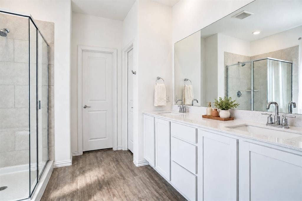 317 Red Cedar Drive, Princeton, TX 75407 Primary Bathroom; Photo has been digitally enhanced and/or virtually staged using AI.