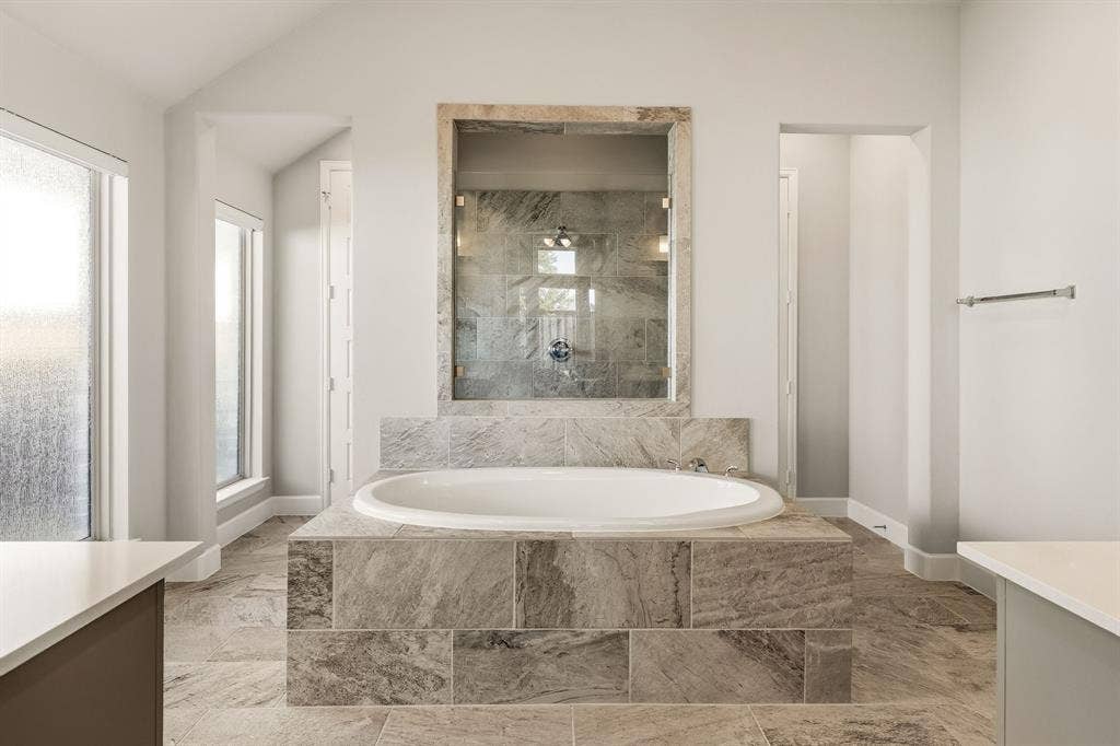 8901 Brandy Branch Way, McKinney, TX 75071 Garden tub and 2 walk-in closets.