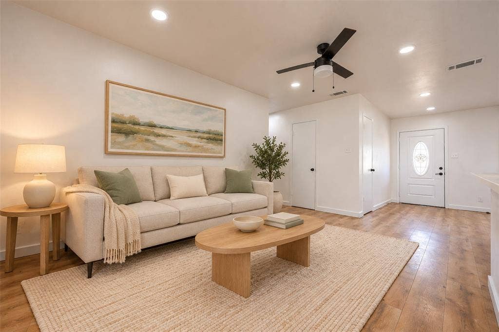 Interior space featuring wood-finish flooring, recessed lighting, and a modern ceiling fan