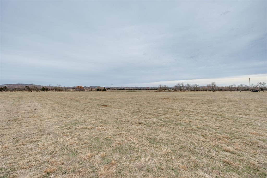 View of grassy yard featuring a view of countryside