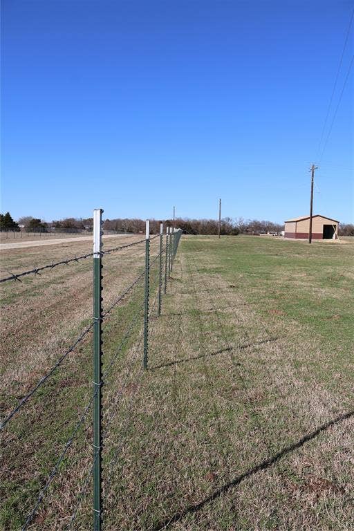 View of grassy yard featuring a view of countryside