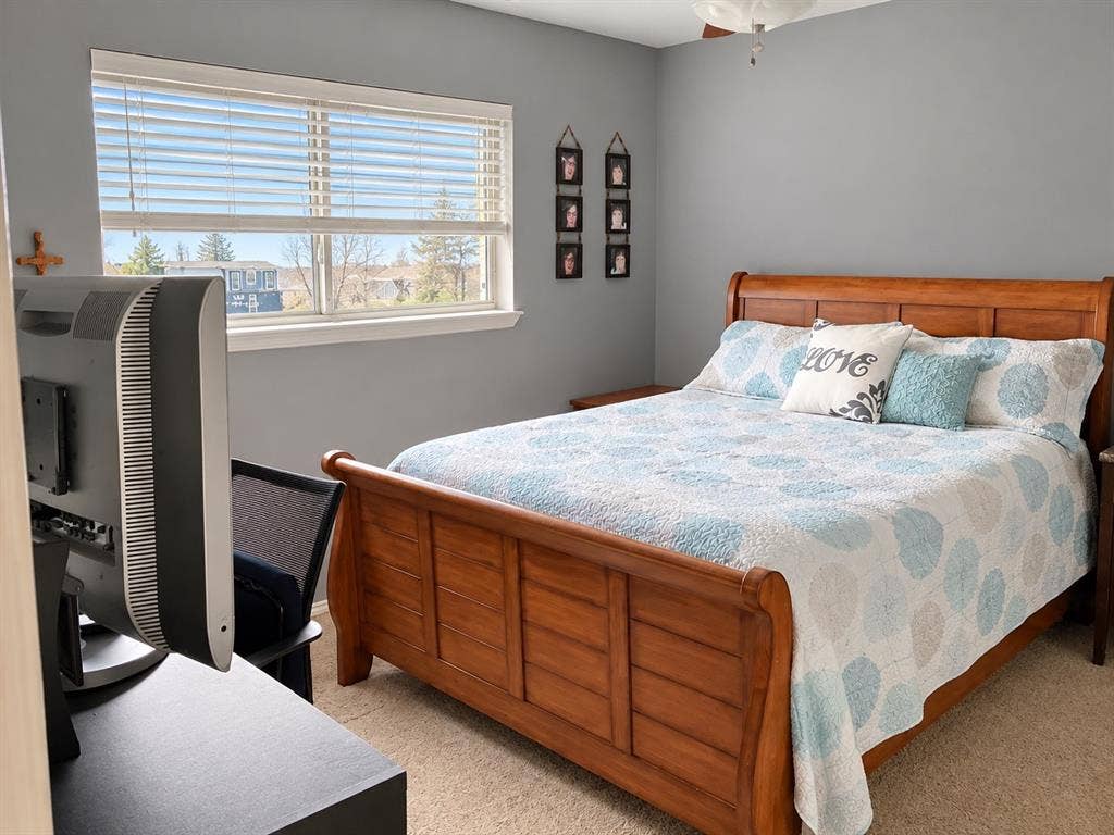 7730 Meadow Park Drive, #222, Dallas, TX 75230 Neutral-toned room featuring a wide window with adjustable blinds and a flush-mount ceiling light fixture