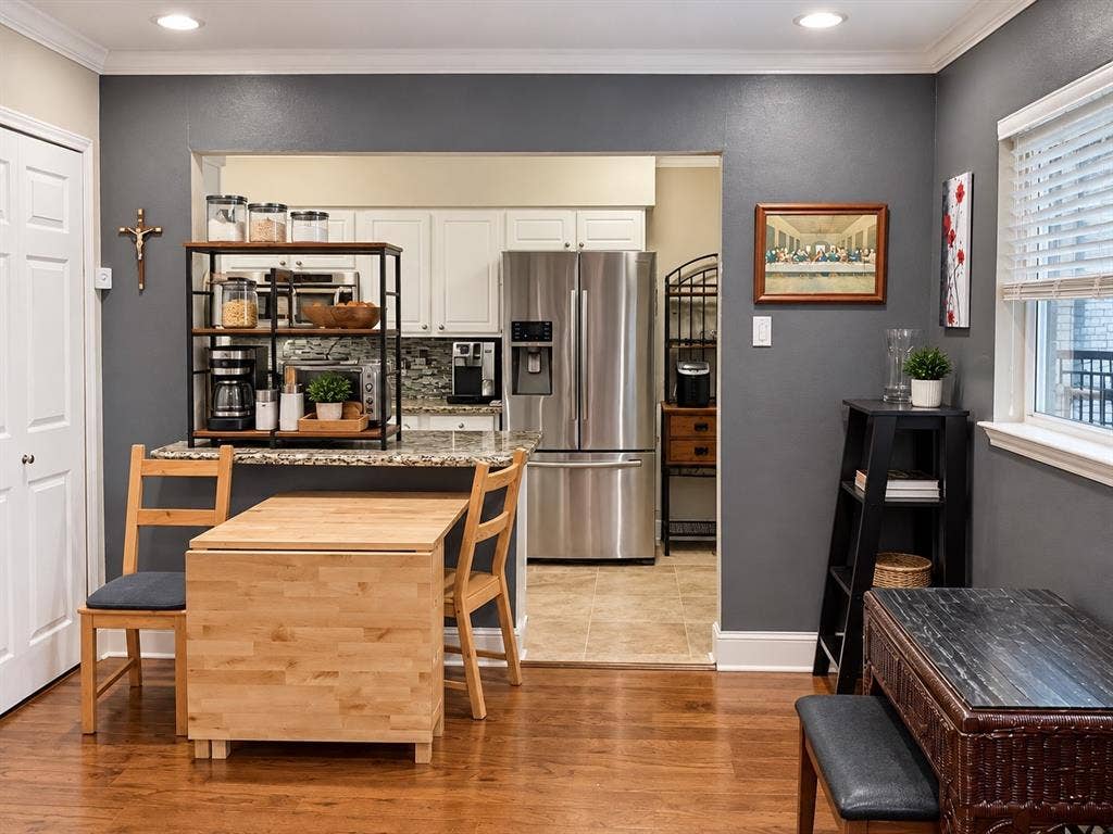 7730 Meadow Park Drive, #222, Dallas, TX 75230 Kitchen featuring white cabinetry, stone countertops, stainless steel refrigerator, and recessed lighting, with wood-finish flooring