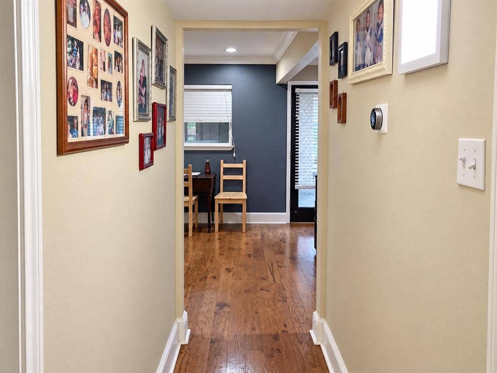 7730 Meadow Park Drive, #222, Dallas, TX 75230 Interior hallway featuring wood-finish flooring, recessed ceiling lighting, and a smart thermostat