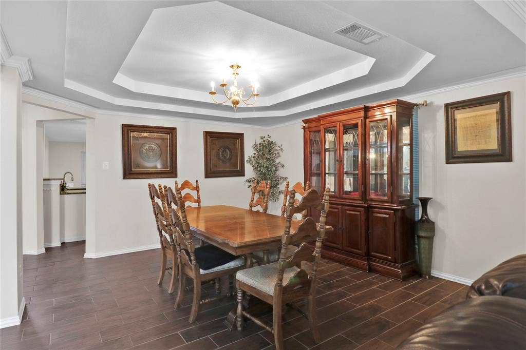 5753 Lionfish Way, Fort Worth, TX 76131 Formal dining. If you are a big entertainer, could make the formal living and formal dining one large dining room.