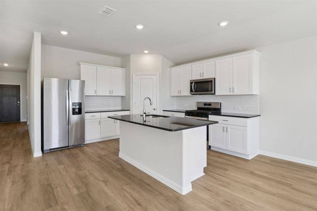 Photo is not of the actual home, but is an inspirational photo of builder’s model home and may depict options, furnishings, and/or decorator features that are not included.