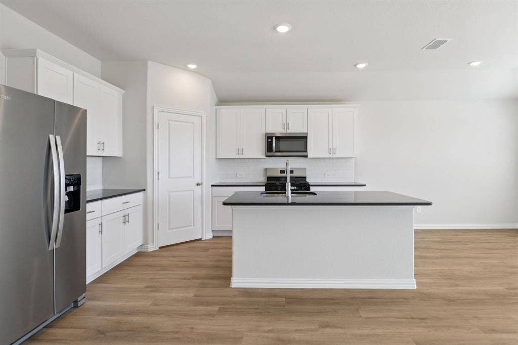 Photo is not of the actual home, but is an inspirational photo of builder’s model home and may depict options, furnishings, and/or decorator features that are not included.