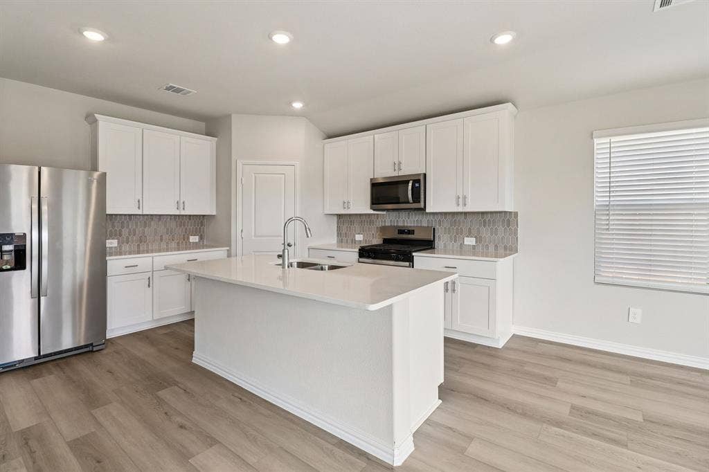 Photo is not of the actual home, but is an inspirational photo of builder’s model home and may depict options, furnishings, and/or decorator features that are not included.