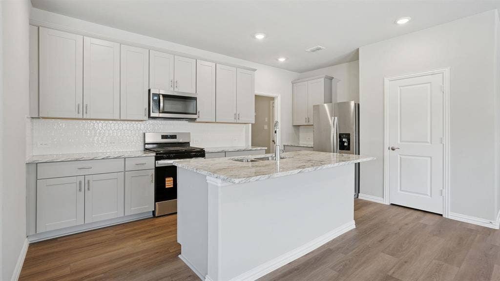 108 Decoursey Drive, Princeton, TX 75071 Photo is not of the actual home, but is an inspirational photo of builder’s model home and may depict options, furnishings, and/or decorator features that are not included.