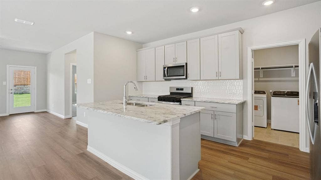 108 Decoursey Drive, Princeton, TX 75071 Photo is not of the actual home, but is an inspirational photo of builder’s model home and may depict options, furnishings, and/or decorator features that are not included.