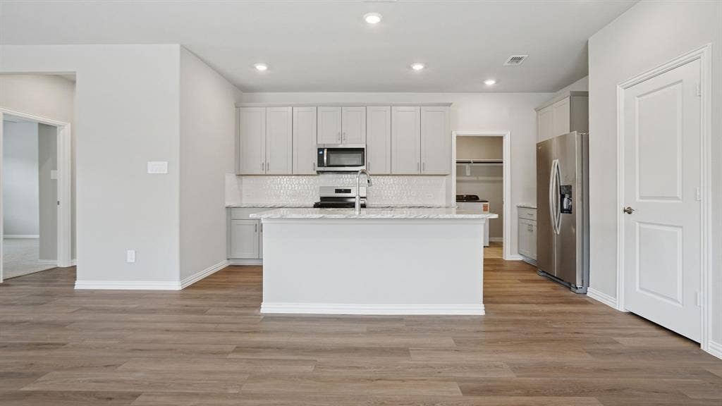 108 Decoursey Drive, Princeton, TX 75071 Photo is not of the actual home, but is an inspirational photo of builder’s model home and may depict options, furnishings, and/or decorator features that are not included.