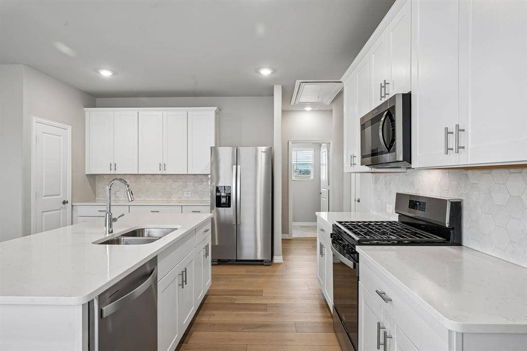 106 Decoursey Drive, Princeton, TX 75071 Photo is not of the actual home, but is an inspirational photo of builder’s model home and may depict options, furnishings, and/or decorator features that are not included.