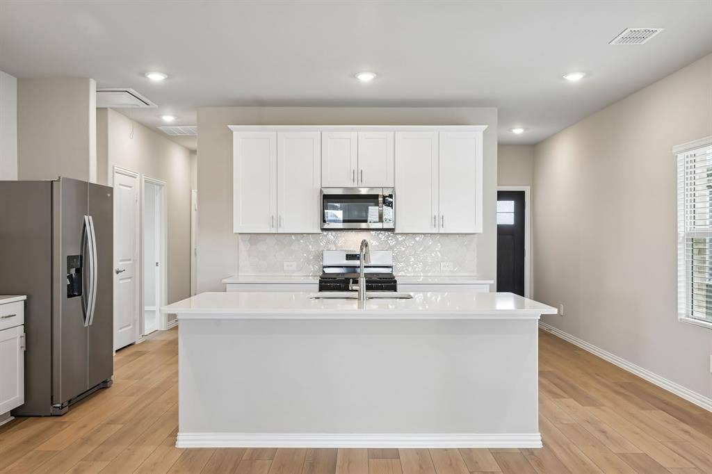 106 Decoursey Drive, Princeton, TX 75071 Photo is not of the actual home, but is an inspirational photo of builder’s model home and may depict options, furnishings, and/or decorator features that are not included.