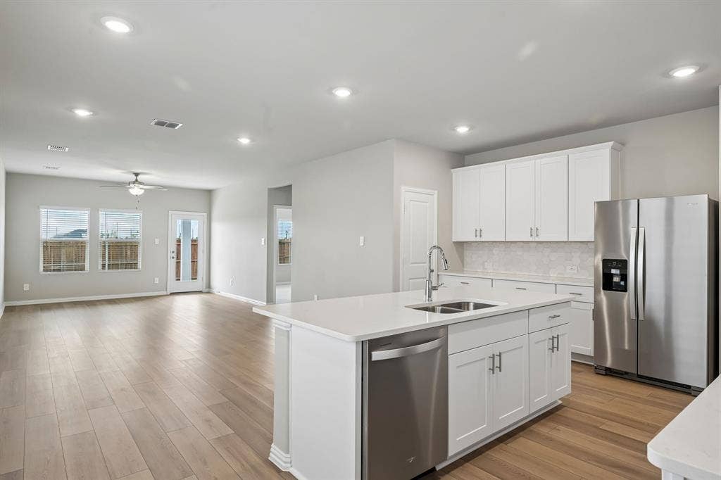 106 Decoursey Drive, Princeton, TX 75071 Photo is not of the actual home, but is an inspirational photo of builder’s model home and may depict options, furnishings, and/or decorator features that are not included.