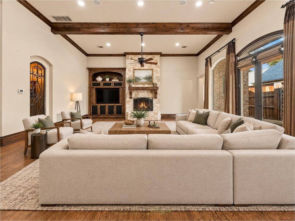 1561 Morris Lane, Frisco, TX 75034 Large Living Area With Fireplace, Built-Ins, Beamed Ceiling, And Access To The Side Patio.