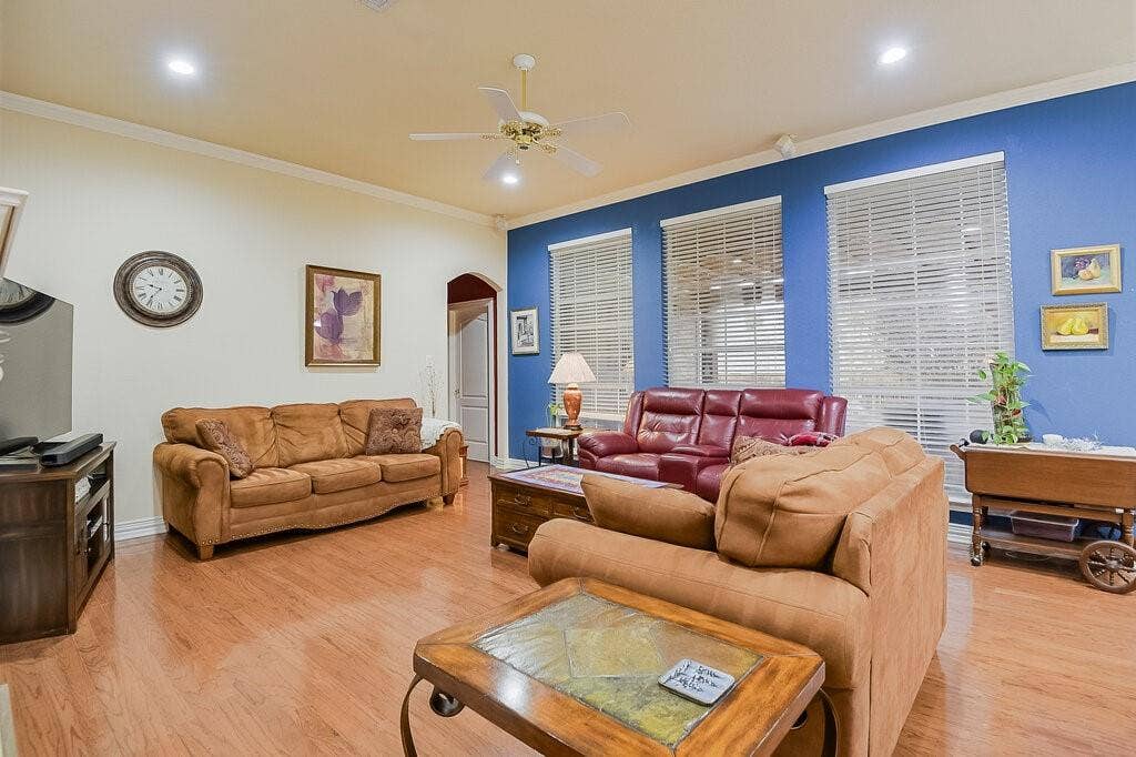 Large windows look out onto spacious patio