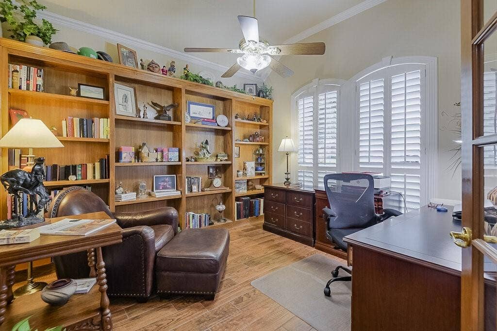 Love the plantation shutters, and all the shelves for your special books and art.