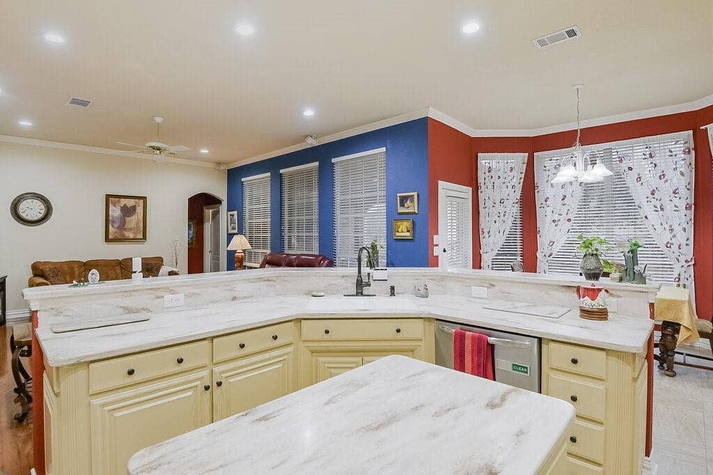 New stainless dishwasher, marble countertops to accent the kitchen with bright colors