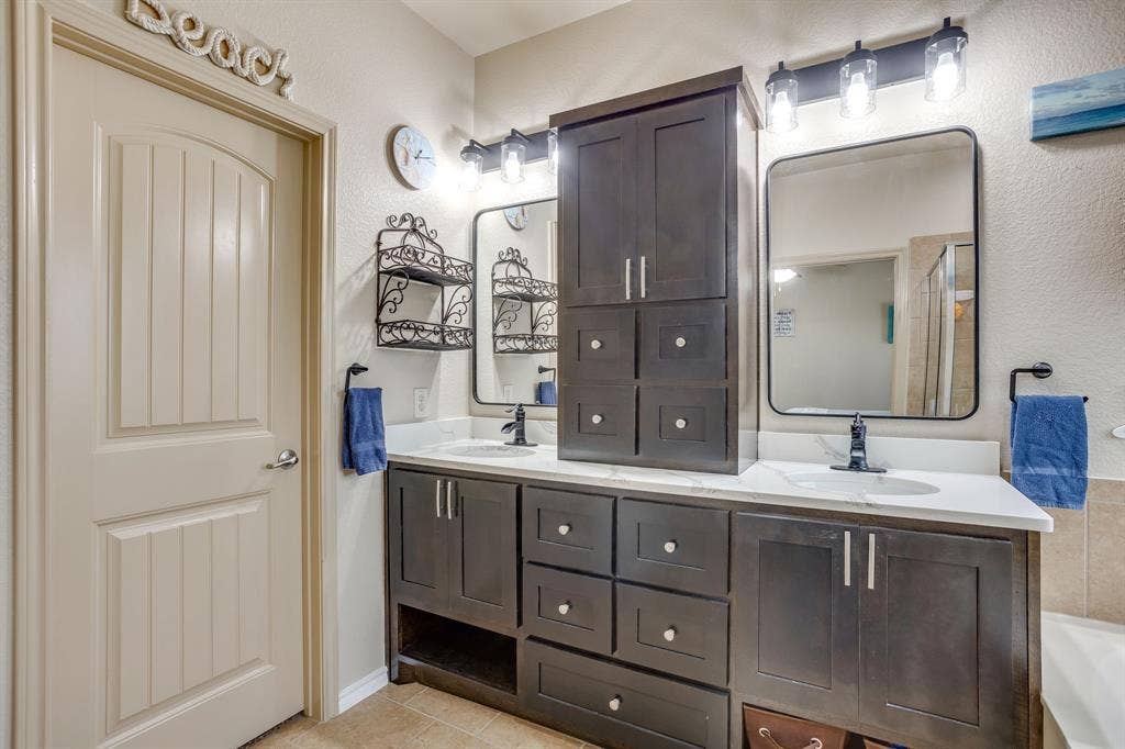 Custom primary bath cabinets dual sinks with Quartz counter