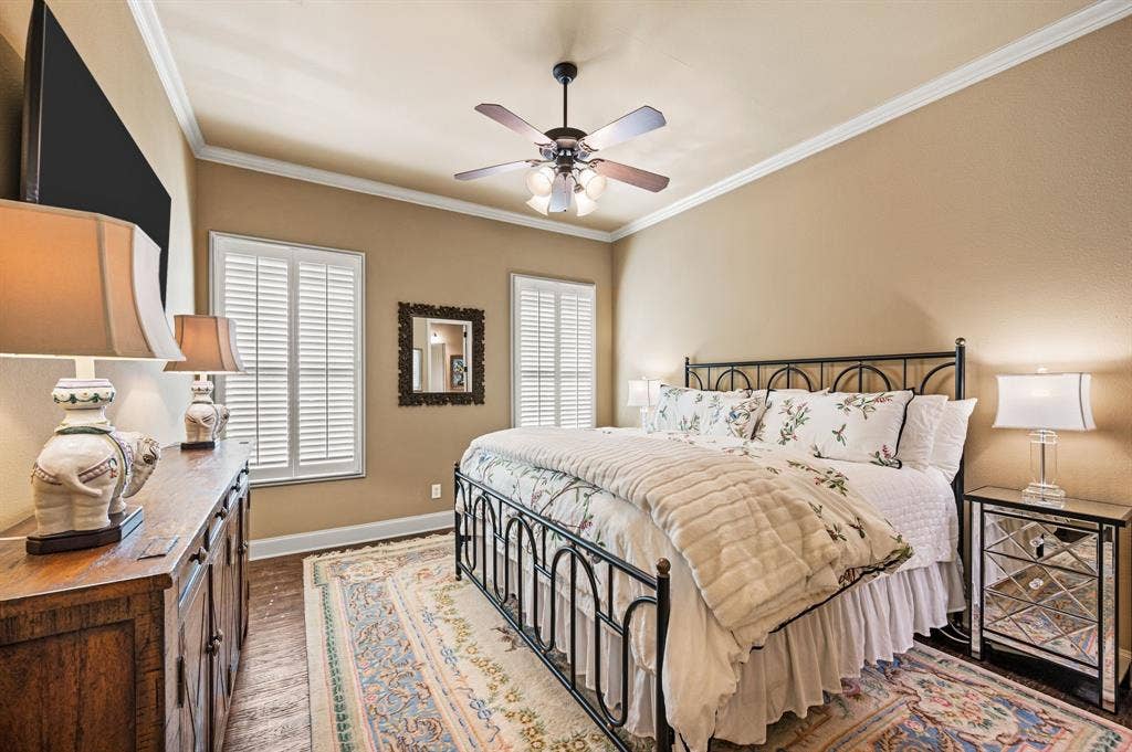 Tucked away from the main living area, the downstairs guest suite offers privacy and comfort, complete with an ensuite bath and spacious walk-in closet.