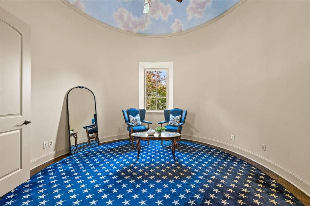 This charming circular bedroom offers a walk-in closet and Jack-and-Jill bath. Ideal as a nursery or a bedroom with twin beds, this versatile space could also serve as a second home office, craft room, or creative retreat.