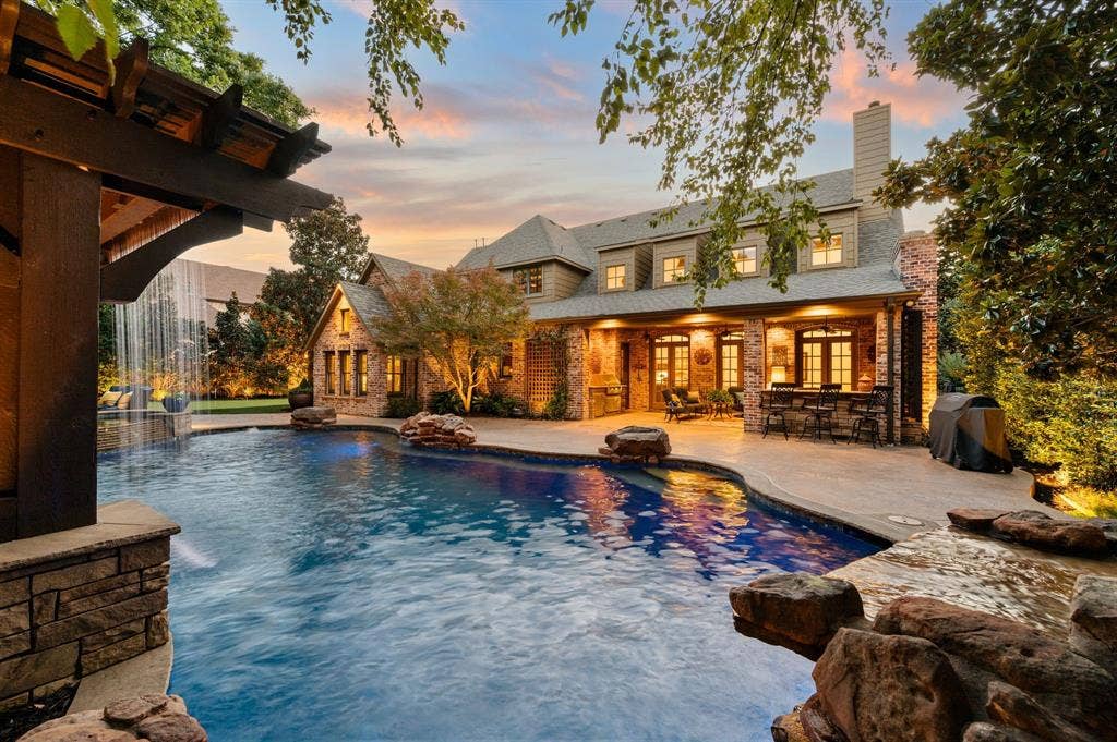 Twilight views of the private backyard, and patio area.