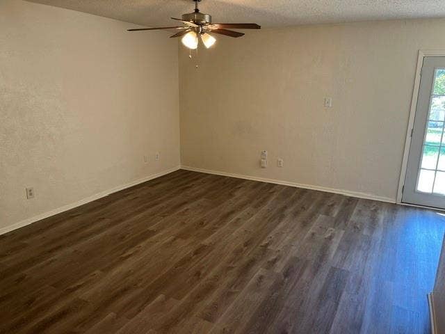 1236 Neptune Drive, Cedar Hill, TX 75104 Wood-finish flooring, ceiling fan with multi-light fixture, and glass-paneled exterior door