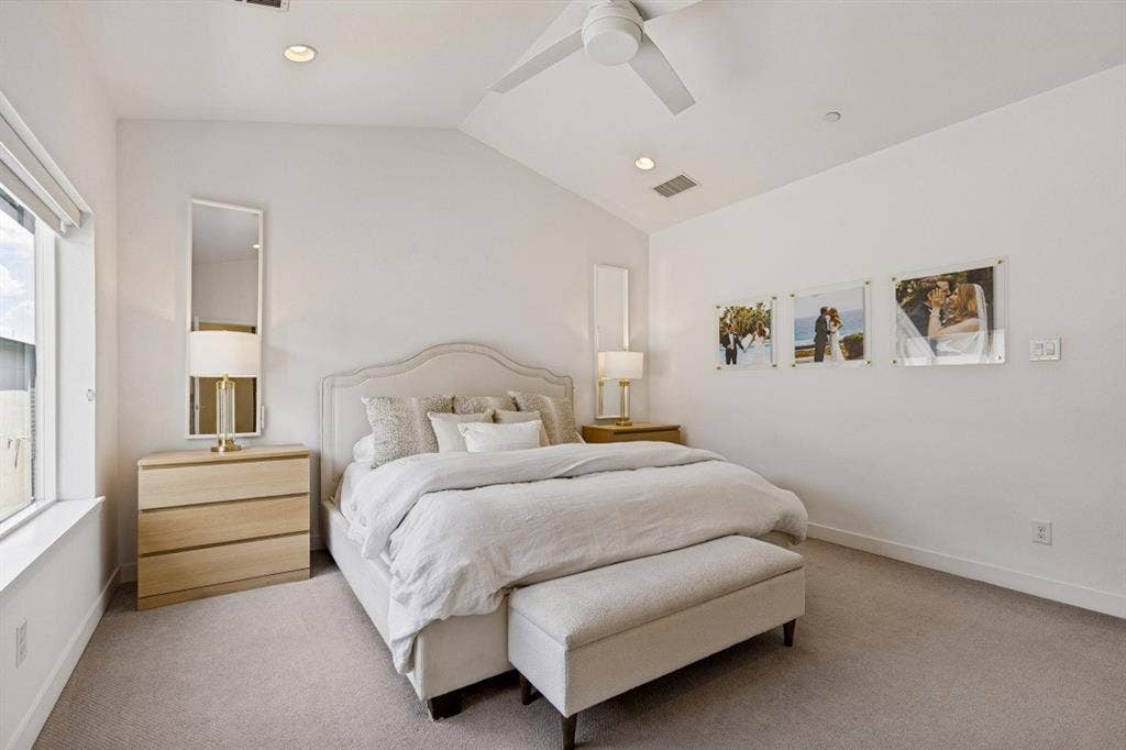 2107 Bennett Avenue, #20, Dallas, TX 75206 Vaulted ceilings, neutral carpeted flooring, recessed lighting, and a modern ceiling fan