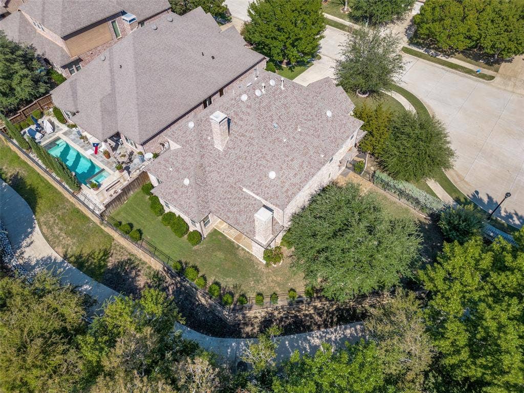 301 Longhorn Drive, McKinney, TX 75071 Beautiful curb appeal welcomes you to this five bedroom Highland home, tucked along a greenbelt on a quiet cul de sac in Stonebridge Ranch.