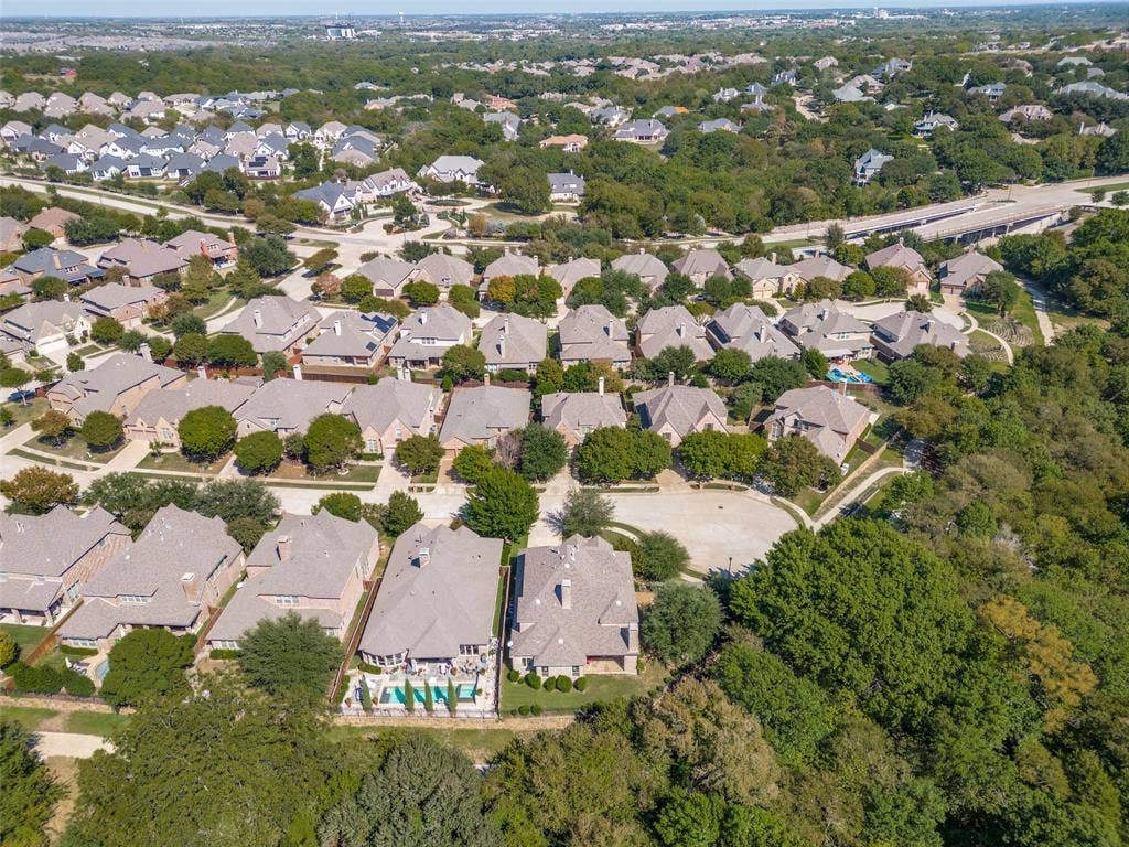 301 Longhorn Drive, McKinney, TX 75071 Beautiful curb appeal welcomes you to this five bedroom Highland home, tucked along a greenbelt on a quiet cul de sac in Stonebridge Ranch.