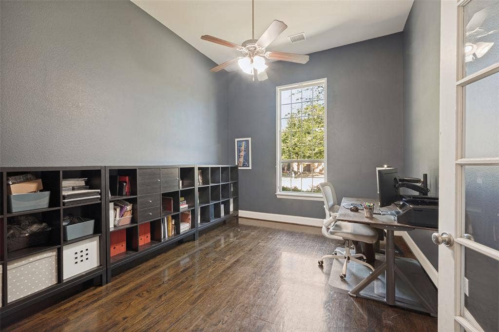 301 Longhorn Drive, McKinney, TX 75071 Executive study with French doors and extensive wood flooring.