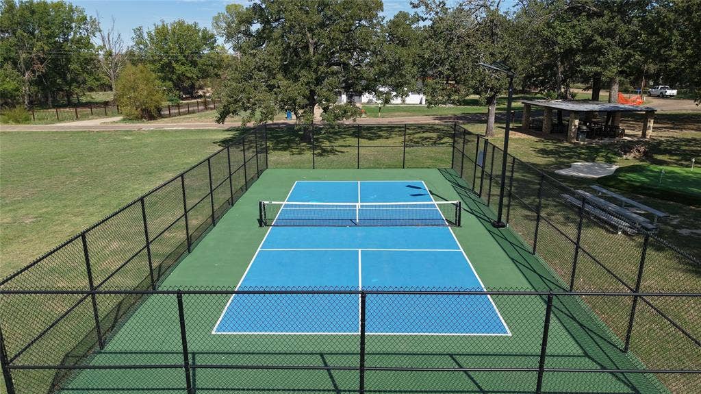409 Oak Creek Drive, Tool, TX 75143 Community pickleball court available for residents to enjoy.