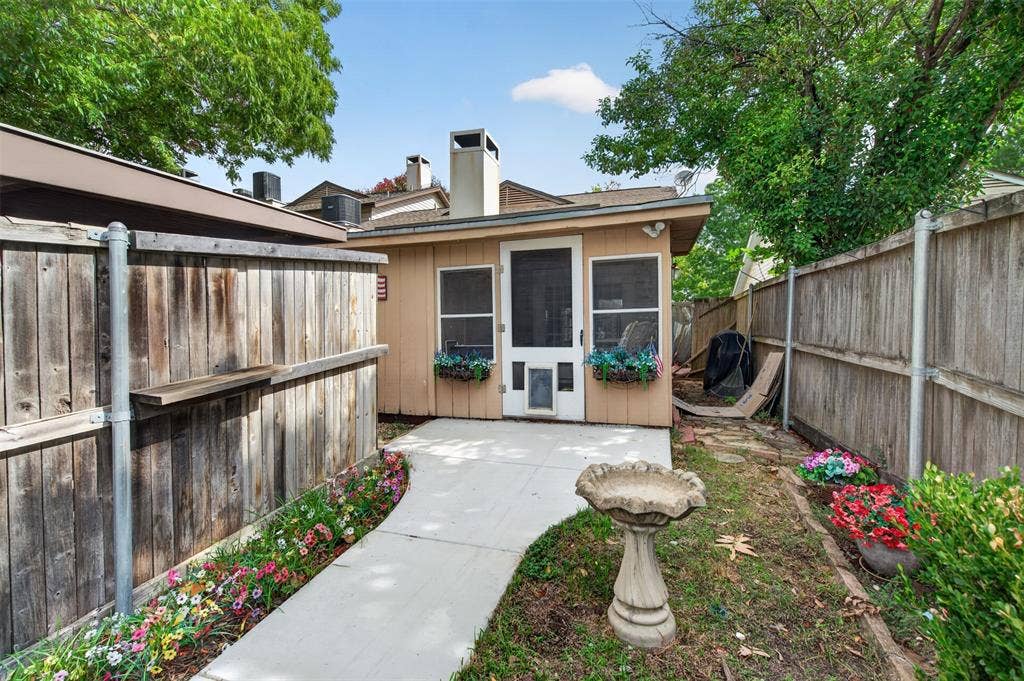 New!  Back Sidewalk to Enclosed Patio
