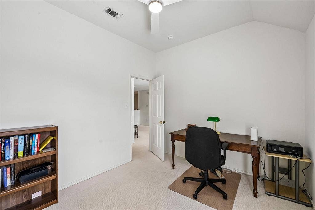 758 Livingston Drive, Allen, TX 75002 Vaulted ceiling featuring a ceiling fan with integrated lighting and neutral carpeting