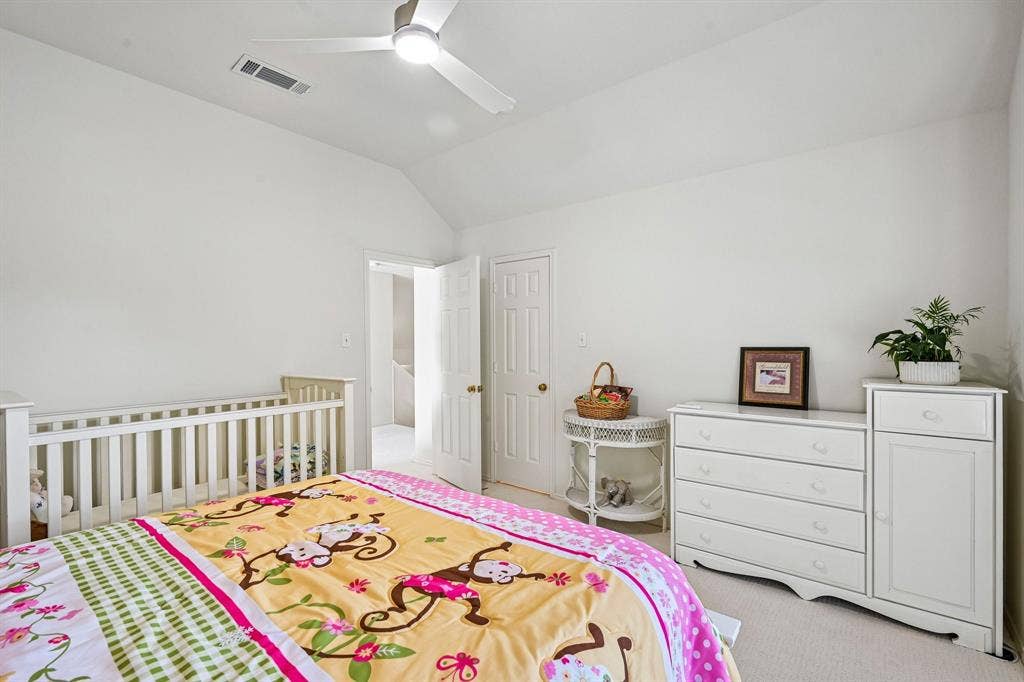 758 Livingston Drive, Allen, TX 75002 Vaulted ceilings, neutral wall color, carpeted flooring, and a ceiling-mounted light fixture with fan