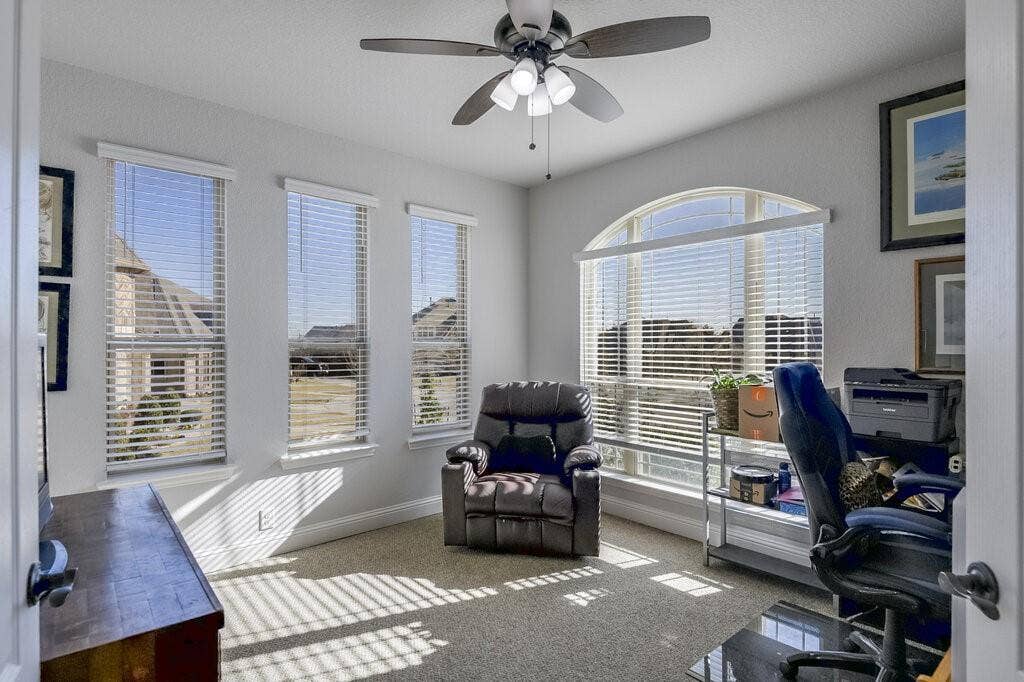 The front room was used as an office, but it does have a full-size closet and double doors. Look at that natural light!