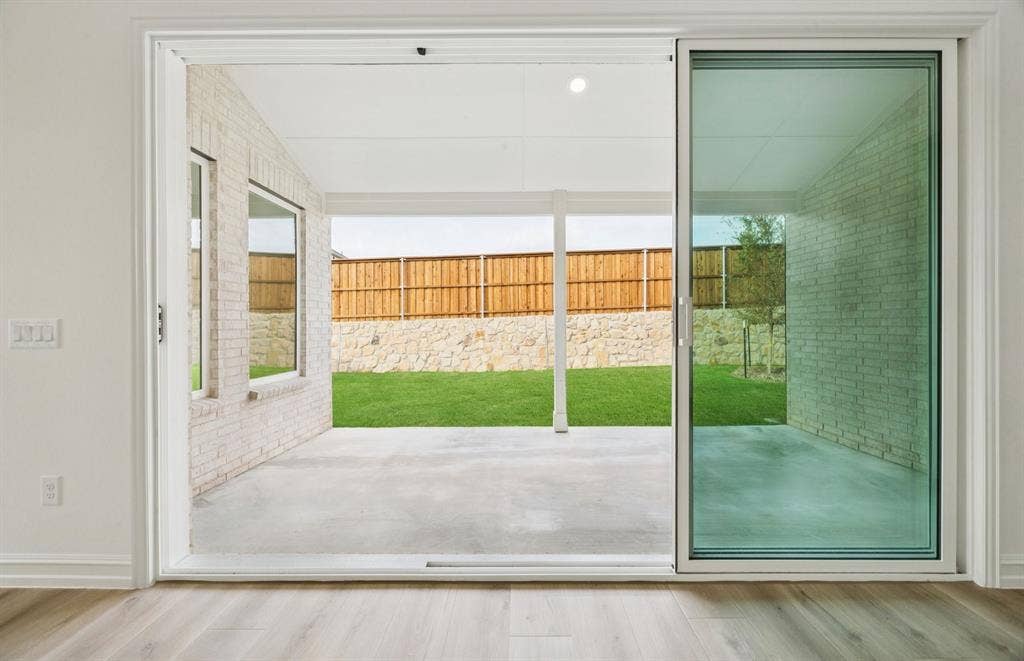 1817 Millswood Drive, Celina, TX 75009 *Floorplan representation, not actual home - Spacious gathering room with sliding glass dooes