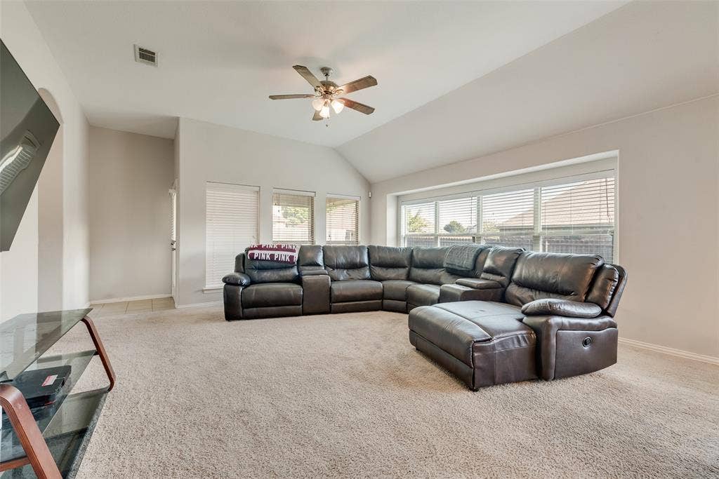 721 Honeysuckle Way, DeSoto, TX 75115 This home has a spacious living area perfect for a movie night!