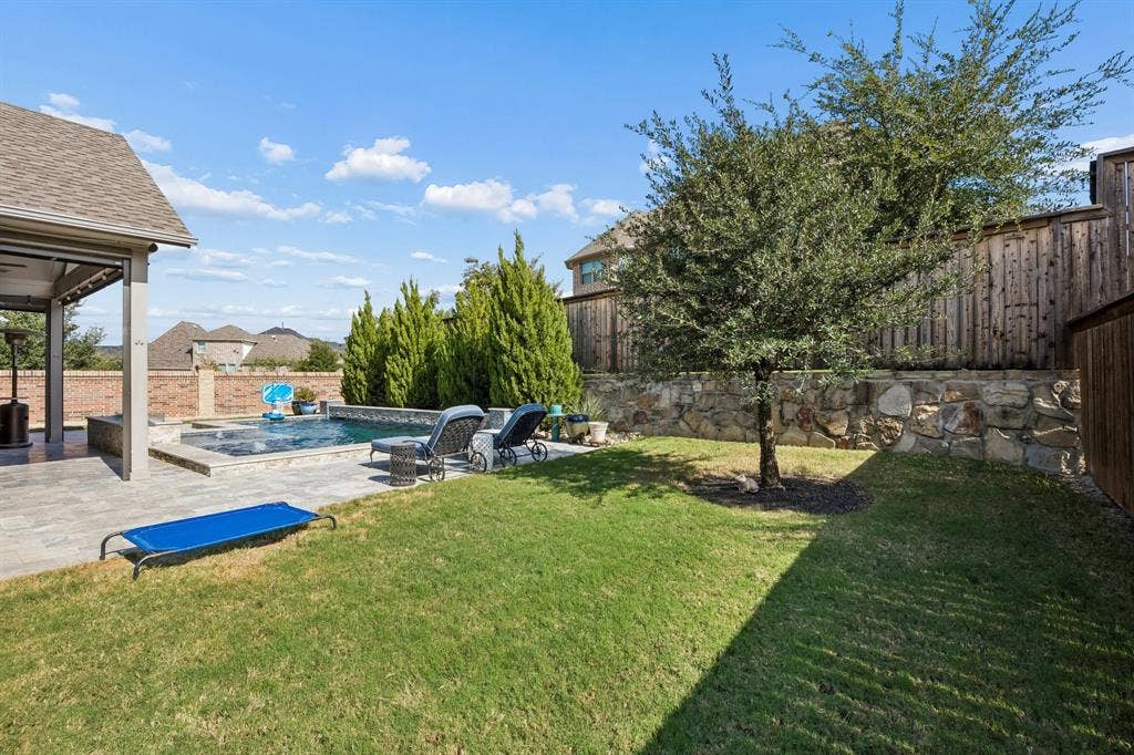 850 Star Meadow Drive, Prosper, TX 75078 Still plenty of grass on both sides of the pool