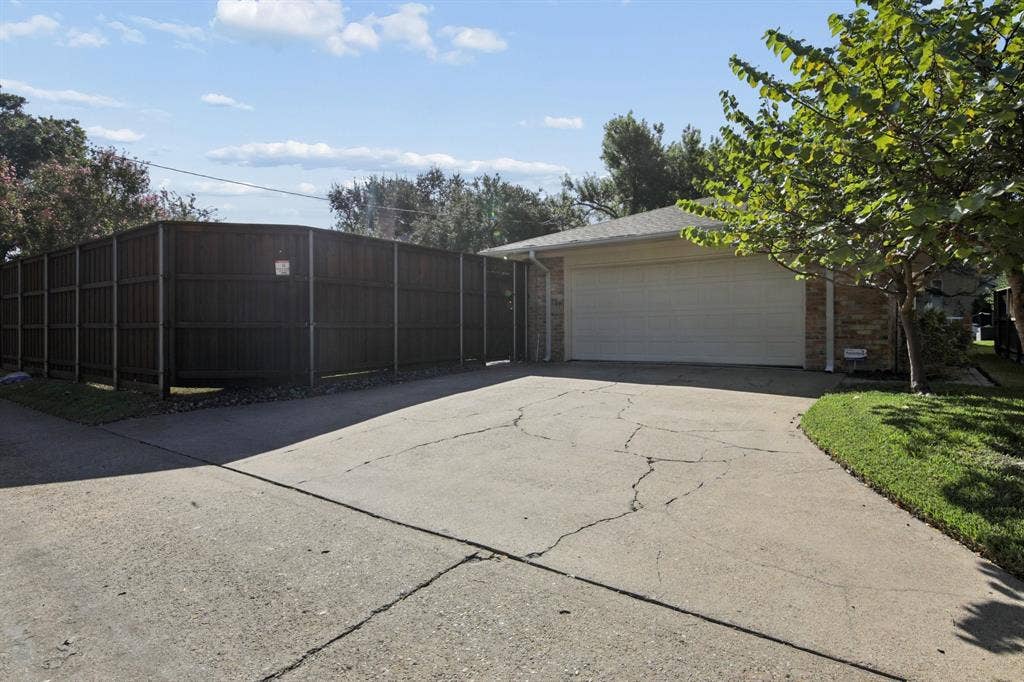 9935 Milltrail Drive, Dallas, TX 75238 Alley entrance