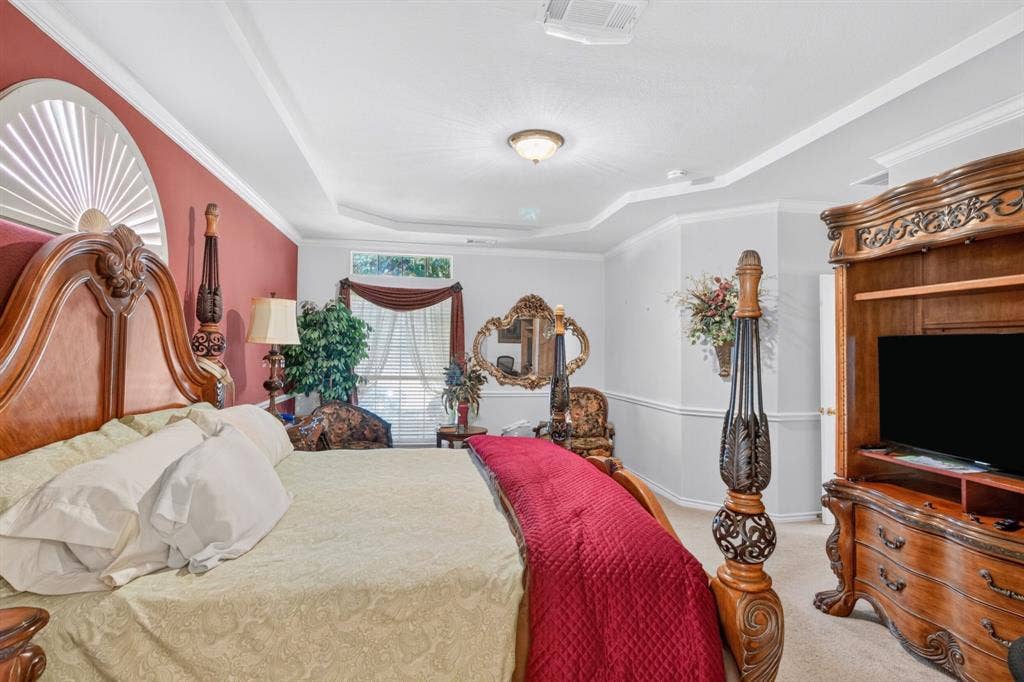 10657 Coach House Lane, Frisco, TX 75035 Alternate primary bedroom view highlights the tray ceiling and room layout.